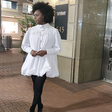 Literary luminary Chimamanda Ngozi Adichie stuns in a white shirt dress by Nigerian label Nola Black