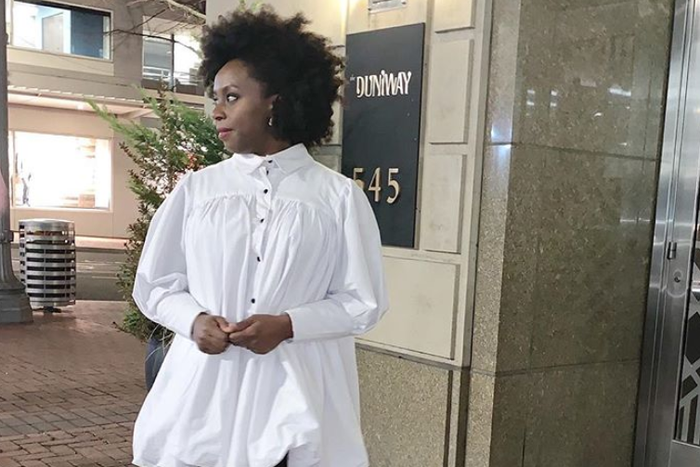 Literary luminary Chimamanda Ngozi Adichie stuns in a white shirt dress by Nigerian label Nola Black
