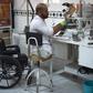 An Afghan orthopaedic technician makes artificial limbs in a workshop at the International Committee of the Red Cross hospital for war victims and the disabled in Kabul