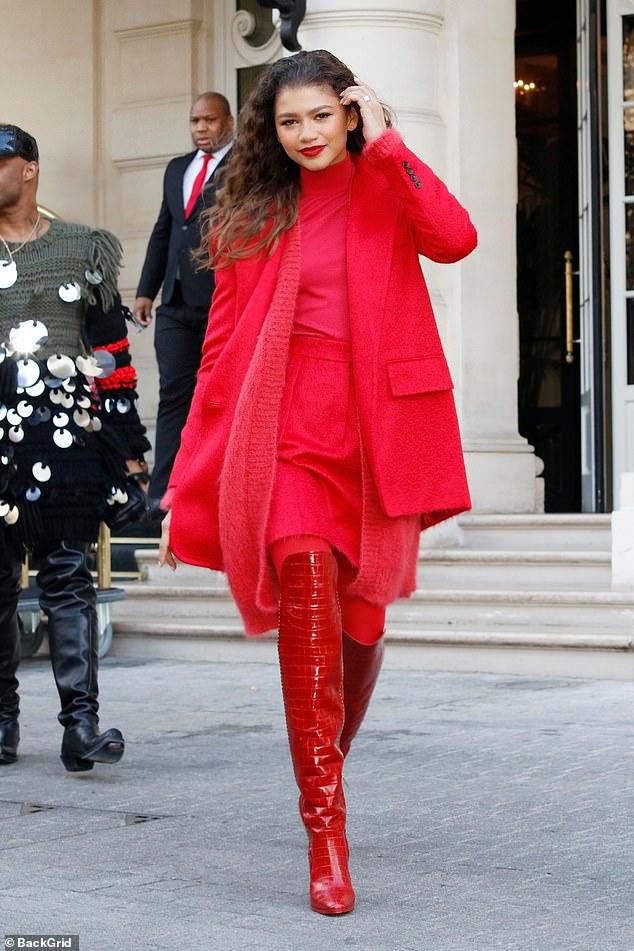 Zendaya steps out of her hotel in Paris in a monochromatic red custom Max Mara look