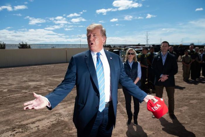 US President Donald Trump tours the border wall between the United States and Mexico in Calexico, California