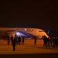 Bangladeshi security personnel stand guard near the hijacked Dubai-bound plane. Officials say the would-be hijacker was carrying a toy gun