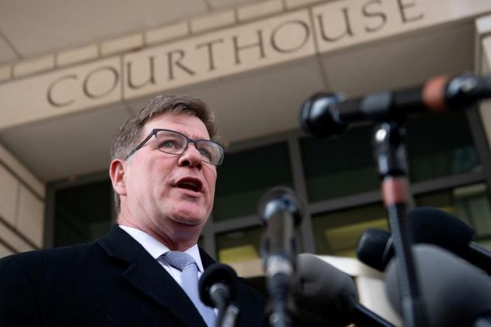 Charles Swift, attorney for Hoda Muthana, an American-born woman who joined the Islamic State group in Syria, speaks to reporters after a hearing in her court case seeking to allow her return to the United States