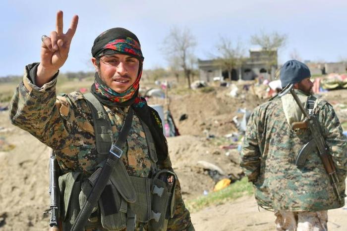 The Syrian Democratic Forces on Saturday celebrated seizing the Islamic State group's last territorial bastion -- but Kurdish officials have warned that IS fighters still pose a danger
