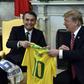 US President Donald Trump(R) and Brazilian President Jair Bolsonaro exchanged team jerseys during their meeting at the Oval Office in the White House