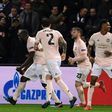 Marcus Rashford celebrates with his teammates after his last-gasp VAR-awarded penalty took Manchester United through at PSG's expense