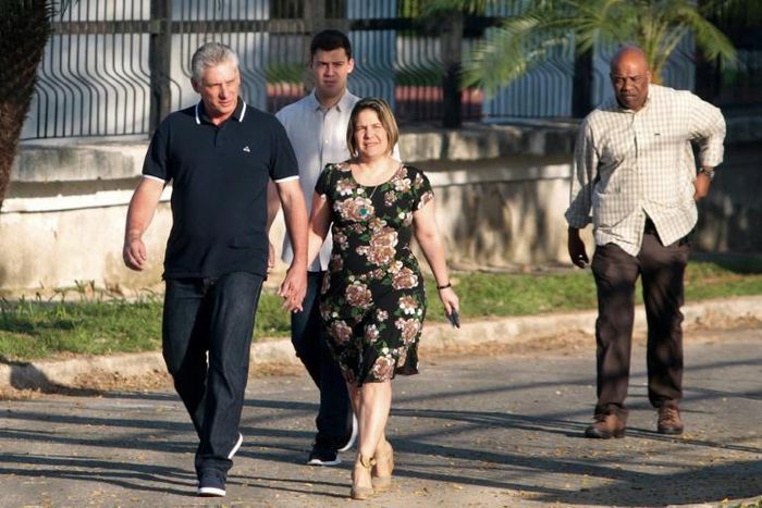 Cuba's President Miguel Diaz-Canel and his wife Lis Cuesta arrive at a polling station to cast their votes for a constitutional referendum in Havana, Cuba, on February 24, 2019