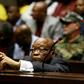 Former South African President Jacob Zuma, seen here in court, used the country's intelligence services for his own ends, notably targeting his successor Cyril Ramaphosa, a government report says