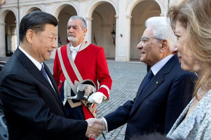 Chinese President Xi Jinping shakes hands with his Italian counterpart Sergio Mattarella in Rome