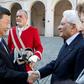 Chinese President Xi Jinping shakes hands with his Italian counterpart Sergio Mattarella in Rome