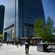 Spanish police remove a cordon outside the Torrespacio skyscraper at the Cuatro Torres (Four Towers) business park in Madrid after a bomb warning proved to be false