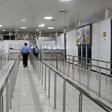 A Libyan policeman walks in the empty Mitiga International Airport in September last year, when the facility was closed by an earlier round of militia clashes