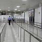 A Libyan policeman walks in the empty Mitiga International Airport in September last year, when the facility was closed by an earlier round of militia clashes