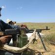 Fighters loyal to Libya's UN-backed unity government hold a position outside Tripoli as they fend off an offensive by strongman Khalifa Haftar