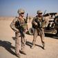 US Marines keep watch as unseen Afghan National Army soldiers participate in an IED (improvised explosive device) training exercise at Shorab Military Camp in Lashkar Gah, Afghanistan on August 28, 2017