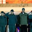 This handout picture released by Miraflores Palace press office shows Venezuela's President Nicolas Maduro (C) receiving a salute from troops at the "Fuerte Tiuna" military headquarters in Caracas, Venezuela