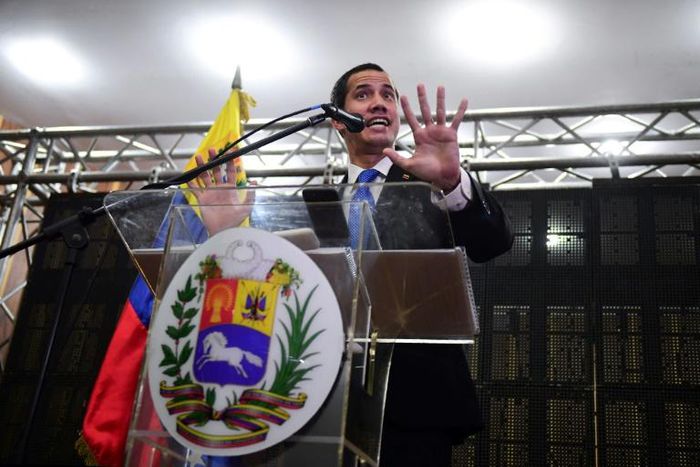 Venezuelan opposition leader and self-declared interim president Juan Guaido talks during a meeting with professionals and technicians at the Caraca's Chamber of Commerce Auditorium, in Caracas on May 16, 2019