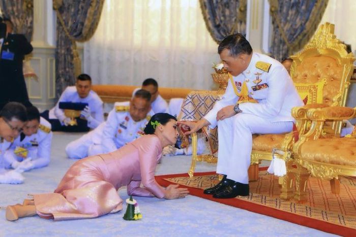 Pictures of the new Queen Suthida prostrating before King Maha Vajiralongkorn were widely used in Thai newspapers