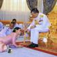 Pictures of the new Queen Suthida prostrating before King Maha Vajiralongkorn were widely used in Thai newspapers