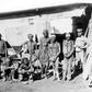 A colonial soldier (R) in German South West Africa (now Namibia) keeps a watchful eye over prisoners taken during the 1904-1908 war against the Herero and Nama people