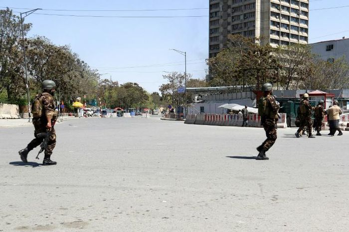 IS claimed responsibility for an attack on a government ministry in Kabul that killed at least seven civilians and three Afghan troops