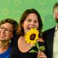 German Green party EU candidate Hannah Neumann (l) celebrates with party co-leader Annalena Baerbock and the Greens top candidate Sven Giegold after the exit poll figures were announced
