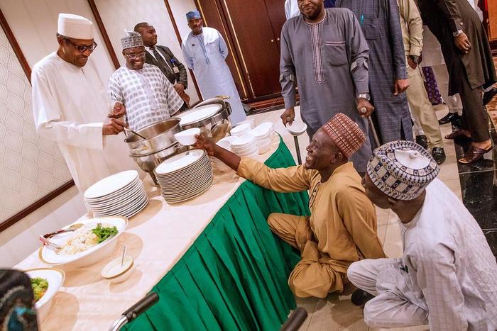President Muhammadu Buhari served a group of physically-challenged Nigerians at Iftar dinner at the State House [NGRPresident]