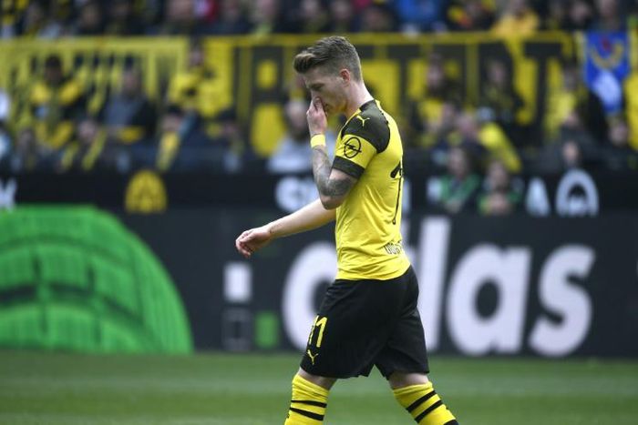 Marco Reus was sent off in Dortmund's 4-2 defeat to rivals Schalke on Saturday