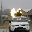 Fighters loyal to the Libyan internationally-recognised Government of National Accord fire a heavy machinegun during clashes against forces loyal to strongman Khalifa Haftar, on May 21, 2019 in the Salaheddin area south of the Libyan capital Tripoli