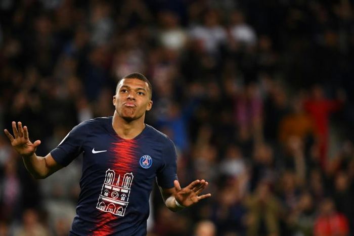 France's World Cup winner Kylian Mbappe scored a hat-trick against Monaco in a shirt paying tribute to the Notre Dame