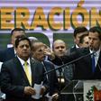 Venezuelan opposition leader Juan Guaido (R) speaking in March 2019 next to the vice president of the Venezuelan National Assembly, Edgar Zambrano who was arrested by intelligence agents