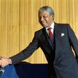 Nelson Mandela became the country's first black president taking over from FW de Klerk (L)