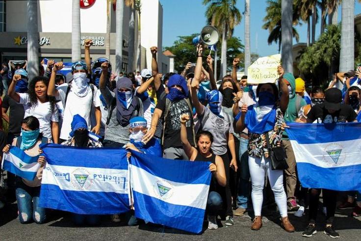 Opposition supporters defy a police ban to demonstrate against Nicaragua President Daniel Ortega