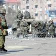 Armenian riot police are seen patrolling Yerevan in March 2008 after a night of violent clashes with supporters of the defeated opposition candidate