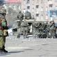 Armenian riot police are seen patrolling Yerevan in March 2008 after a night of violent clashes with supporters of the defeated opposition candidate