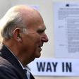 Liberal Democrats leader Vince Cable arrives to vote in the European Parliament elections on Sunday which preliminary results later showed his party winning the anti-Brexit vote