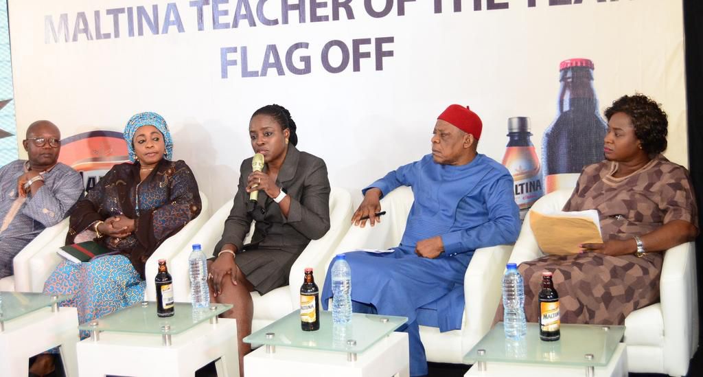 L-R; The President, All Nigeria Confederation of Principals of Secondary Schools (ANCOPSS), Principal Anselm Izuagie; Director, Basic & Secondary Education, Federal Ministry of Education, Dr. Lami Amodu; Corporate Affairs Director, Nigerian Breweries P...