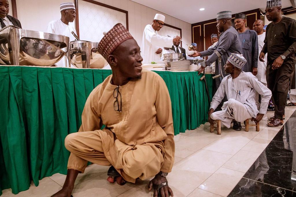 President Muhammadu Buhari served a group of physically-challenged Nigerians at Iftar dinner at the State House [NGRPresident]