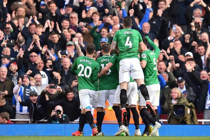 Brighton celebrate their goal against Arsenal