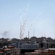 Palestinian militants in Gaza fire a barrage of rockets at Israel, prompting retaliatory air strikes as a fragile ceasefire again falters