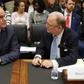 Federal Aviation Administration acting Administrator Daniel Elwell (L) and National Transportation Safety Board Chairman Robert Sumwalt talk before testifying at a House panel on the Boeing 737 MAX