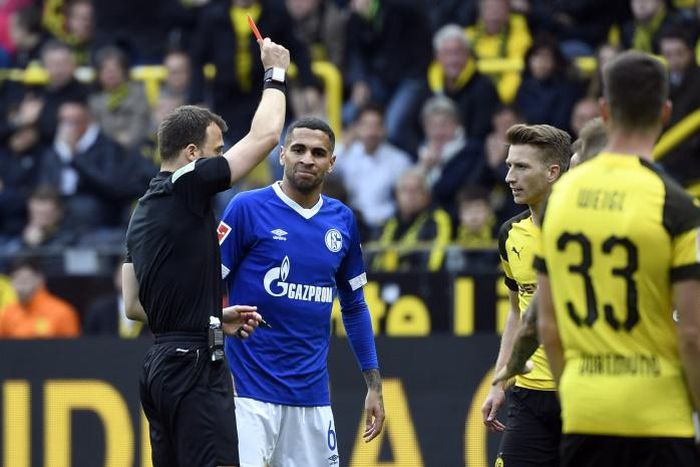 Marco Reus was sent off for a studs-up challenge on Schalke's Suat Serdar during Saturday's derby