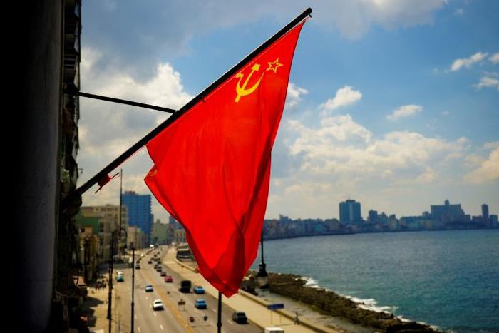Almost 30 years after the Soviet Union was dissolved its flag still flies over the sea front in Havana