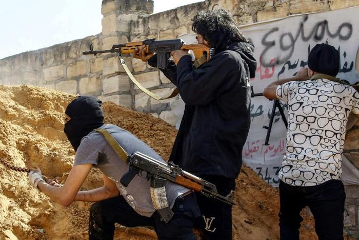 Pro-government forces are battling fighters from commander Khalifa Haftar's self-styled Libyan National Army