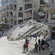 Members of the Syrian Civil Defence, also known as the "White Helmets", search the rubble of a collapsed building following an explosion in the town of Jisr al-Shughur, in the mostly rebel-held Syrian province of Idlib, on April 24, 2019