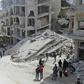 Members of the Syrian Civil Defence, also known as the "White Helmets", search the rubble of a collapsed building following an explosion in the town of Jisr al-Shughur, in the mostly rebel-held Syrian province of Idlib, on April 24, 2019