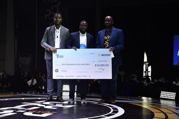 L-R: Uche Okafor; Regional Manager, West Africa, Bolt, Oghenetega Lortim; Start-up winner and Founder of Gricd and Segun Adeniyi; Head Africa Fintech Foundry presenting the dummy cheque to Start-up winner