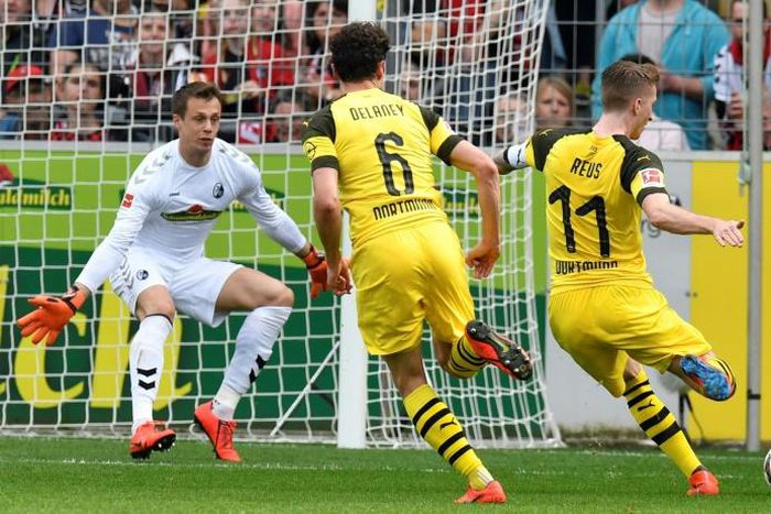 Marco Reus inspired Borussia Dortmund to a crucial win over Freiburg in the Bundesliga on Sunday