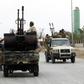Fighters loyal to Libya's internationally-recognised Government of National Accord wait near the frontline on May 21, 2019 during clashes against forces loyal to strongman Khalifa Haftar, who said the conditions for halting hostilities "were not met"