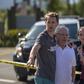 People embrace on April 27, 2019 outside the synagogue in Poway, California, where a gunman opened fire earlier, killing a woman and wounding three people